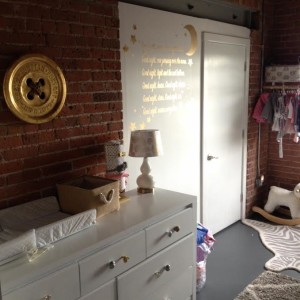 Gold Leaf Button on display in a babies nursery